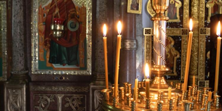 gold candle holder with candles