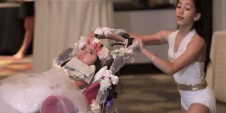 12χρονο κορίτσι διακόπτει τον γάμο και ανεβαίνει στην πίστα μαζί με την ανάπηρη αδερφή της. Ο λόγος; Θα σας κάνει να δακρύσετε (Video)