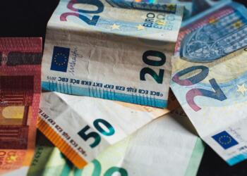 20 euro bill on white textile