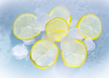 Sliced Lemon on Ice Water