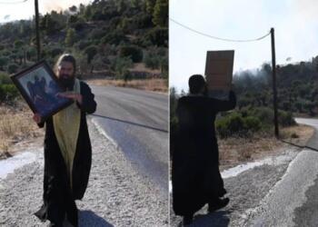 Ιερέας στην Βοιωτία «ξορκίζει» την φονική πυρκαγιά κάνοντας περιφορά εικόνας και προσευχή