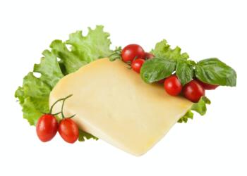 red tomatoes beside white cheese