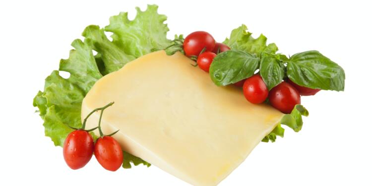 red tomatoes beside white cheese