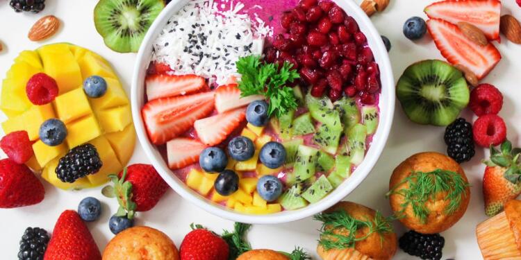 Assorted Sliced Fruits in White Ceramic Bowl
