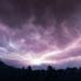 silhouette of mountain under cloudy sky during daytime