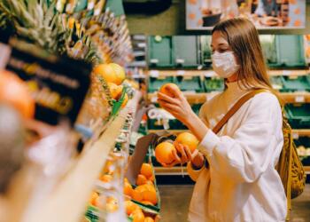 Woman Wearing Mask in Supermarket