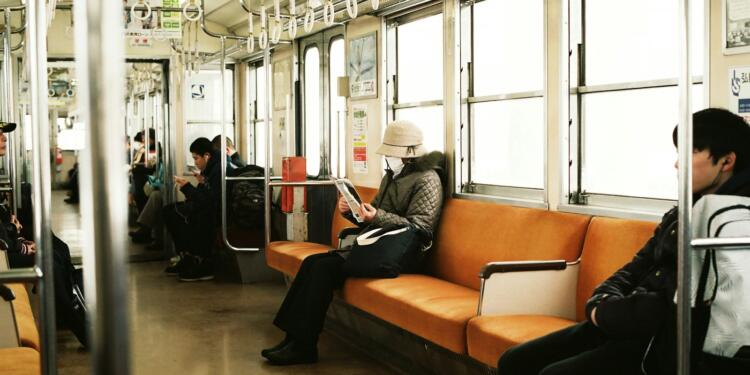 man sitting inside the train